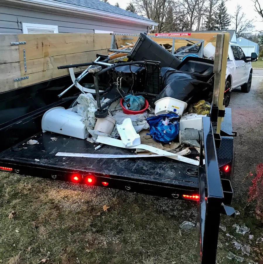 Roll-off dumpster delivered to a residential driveway in Killingworth