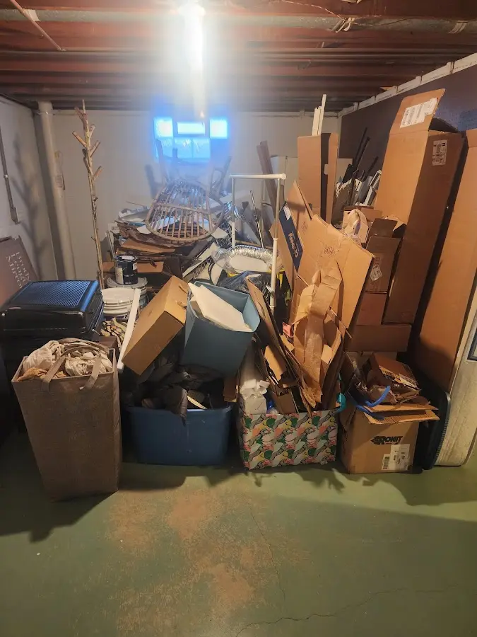 Roll-off dumpster container at job site for 20 Yard Dumpster Rental in Killingworth